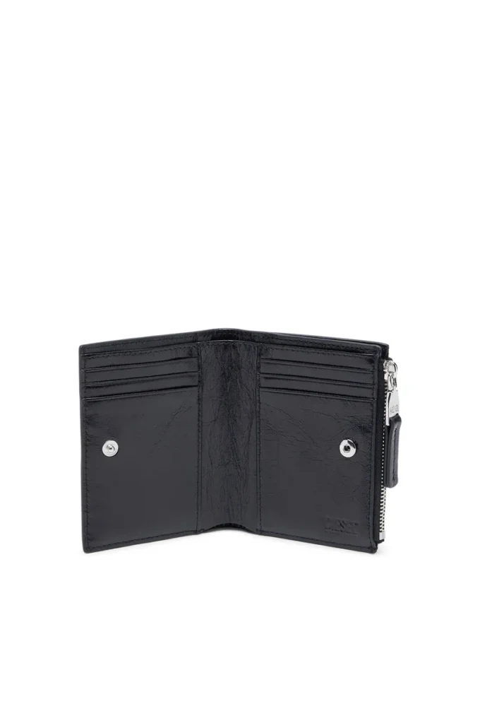 bi-fold zip ii Portefeuille en cuir avec motif chaîne en relief
