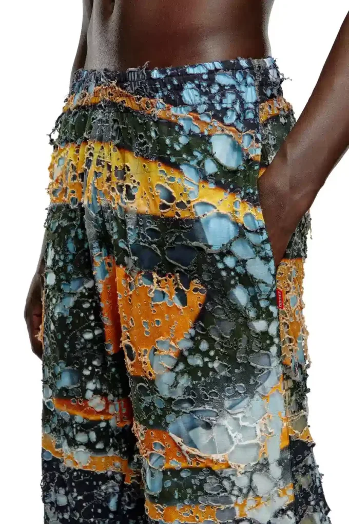 p-leopes-peel Pantalon déchiré avec imprimés cinéma