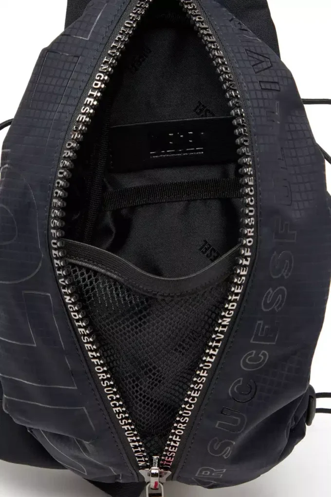 Sac à bandoulière Zip-D-Sling en jacquard à carreaux