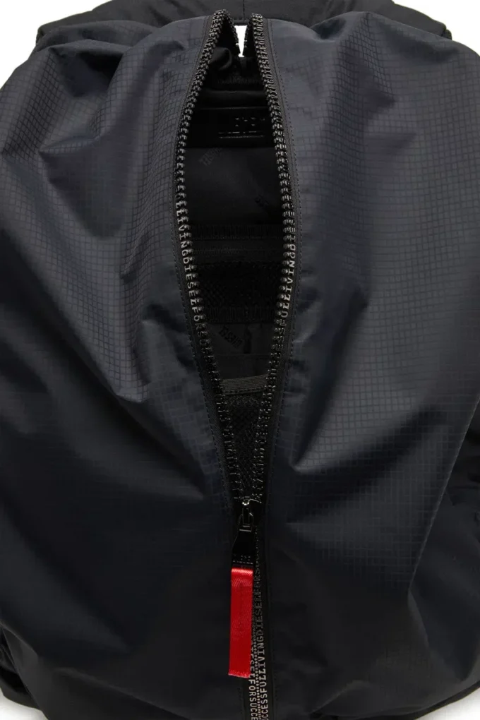 Sac à dos Zip-D Sac à dos Zip-D en jacquard à carreaux